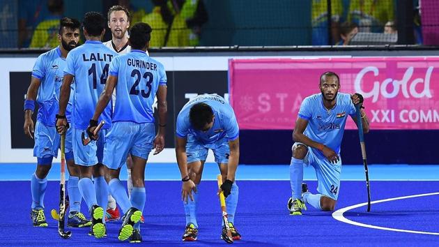 India's hockey team players sit dejected on the pitch after losing to England during their men's field hockey bronze medal match of the 2018 Gold Coast Commonwealth Games at the Gold Coast Hockey Centre on the Gold Coast on April 14, 2018.(AFP) India's hockey team players sit dejected on the pitch after losing to England during their men's field hockey bronze medal match of the 2018 Gold Coast Commonwealth Games at the Gold Coast Hockey Centre on the Gold Coast on April 14, 2018.(AFP)