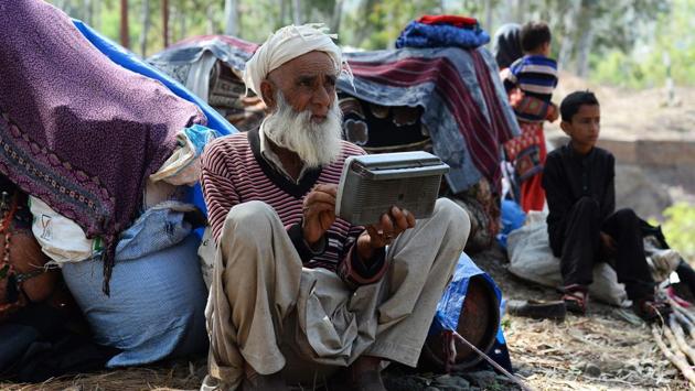 The Bakarwals have followed with horror the accounts of the suffering inflicted on the girl. “A lot of us were traumatised,” said Gulam Mohammad, who found out about the crime by listening to his old transistor radio. “We have daughters here with us. We sleep badly at night because we set up camp on the roadside and we are worried that someone could come,” the 74-year-old added. (Sajjad Hussain / AFP) The Bakarwals have followed with horror the accounts of the suffering inflicted on the girl. “A lot of us were traumatised,” said Gulam Mohammad, who found out about the crime by listening to his old transistor radio. “We have daughters here with us. We sleep badly at night because we set up camp on the roadside and we are worried that someone could come,” the 74-year-old added. (Sajjad Hussain / AFP)