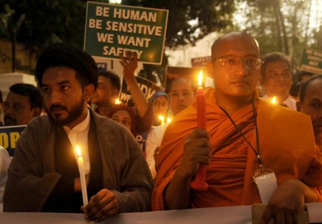 People from across communities participate in a peaceful march in Kolkata to condemn the rape and murder of an 8-year-old in Kathua.(Samir Jana / HT Photo)