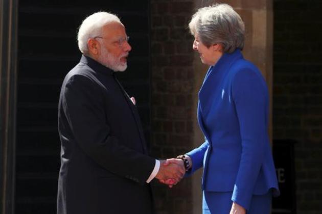 Prime Minister Narendra Modi with Britain's Prime Minister Theresa May in London on April 19, 2018. (Reuters) Prime Minister Narendra Modi with Britain's Prime Minister Theresa May in London on April 19, 2018. (Reuters)