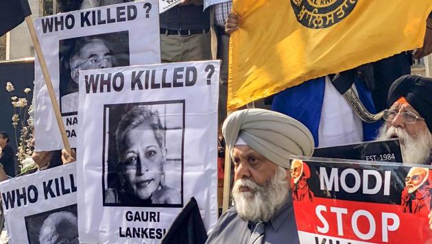 Members of the Sikh community protest against Prime Minister Narendra Modi in London on Wednesday. Modi is in UK as a part of a five-day international tour.(PTI)