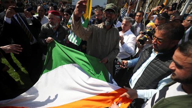 Protesters ripped up India's flag after tearing it off a flagpole in Parliament Square, London, on April 18, 2018. (REUTERS) Protesters ripped up India's flag after tearing it off a flagpole in Parliament Square, London, on April 18, 2018. (REUTERS)