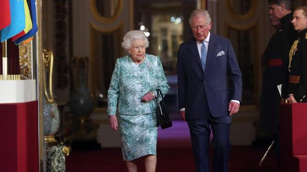 Britain's Queen Elizabeth II and Britain's Prince Charles, Prince of Wales arrive for the formal opening of the Commonwealth Heads of Government Meeting (CHOGM), in the ballroom at Buckingham Palace in London on April 19, 2018.(AFP Photo) Britain's Queen Elizabeth II and Britain's Prince Charles, Prince of Wales arrive for the formal opening of the Commonwealth Heads of Government Meeting (CHOGM), in the ballroom at Buckingham Palace in London on April 19, 2018.(AFP Photo)