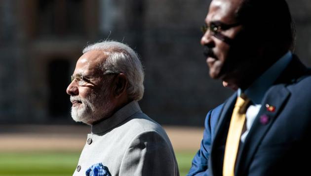 Prime Minister Narendra Modi and Prime Minister of Antigua and Barbuda Gaston Browne arrive at Windsor Castle for a Commonwealth Heads of Government meeting (CHOGM) retreat in Windsor, west of London on April 20, 2018.(Getty Images)