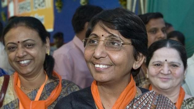 The Gujarat high court on Friday acquitted former BJP minister Maya Kodnani and upheld the conviction of Bajrang Dal leader Babu Bajrangi in the 2002 Naroda Patiya riots case, in which 97 people were killed. On February 28 that year, 97 people from the Muslim community -- mostly migrants from Karnataka and Maharashtra -- were slaughtered by a mob of Vishwa Hindu Parishad and Bajrang Dal supporters. The locality with nearly 800 houses was set on fire. (Sam Panthaky / AFP File ) The Gujarat high court on Friday acquitted former BJP minister Maya Kodnani and upheld the conviction of Bajrang Dal leader Babu Bajrangi in the 2002 Naroda Patiya riots case, in which 97 people were killed. On February 28 that year, 97 people from the Muslim community -- mostly migrants from Karnataka and Maharashtra -- were slaughtered by a mob of Vishwa Hindu Parishad and Bajrang Dal supporters. The locality with nearly 800 houses was set on fire. (Sam Panthaky / AFP File )