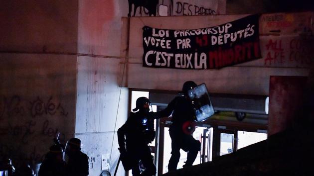 Protesters had blocked access for several days, piling up tables and chairs to control who was coming in, setting up communal kitchen and dormitories and organising non-curriculum classes. (AFP) Protesters had blocked access for several days, piling up tables and chairs to control who was coming in, setting up communal kitchen and dormitories and organising non-curriculum classes. (AFP)