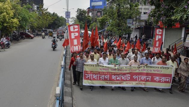 File photo of CPI(M) supporters protesting in Siliguri on April 13, against violence allegedly by activists of the ruling Trinamool Congress. (AFP) File photo of CPI(M) supporters protesting in Siliguri on April 13, against violence allegedly by activists of the ruling Trinamool Congress. (AFP)
