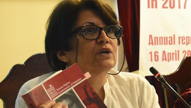 In this Monday, April 16, 2018 photo Maryam Hasan shows the Human Rights Commission Report 2017 in Islamabad, Pakistan. (AP) In this Monday, April 16, 2018 photo Maryam Hasan shows the Human Rights Commission Report 2017 in Islamabad, Pakistan. (AP)