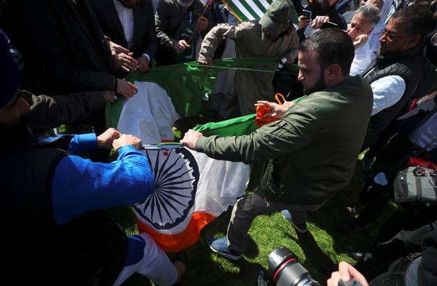 India on Friday expressed “deep anguish” at tricolour being pulled down, torn and stamped on during Prime Minister Narendra Modi’s visit in London and said it expects the UK government to take action, including legal measures, against those responsible. Britain officially apologised on Thursday for the incident that prompted a strong protest from the Indian high commission. (Hannah McKay / REUTERS) India on Friday expressed “deep anguish” at tricolour being pulled down, torn and stamped on during Prime Minister Narendra Modi’s visit in London and said it expects the UK government to take action, including legal measures, against those responsible. Britain officially apologised on Thursday for the incident that prompted a strong protest from the Indian high commission. (Hannah McKay / REUTERS)