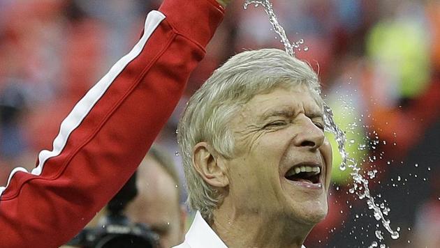 Wenger took Arsenal into the Champions League for 20 years in a row. They won the league and FA cup double in 1998 and 2002. (AP) 