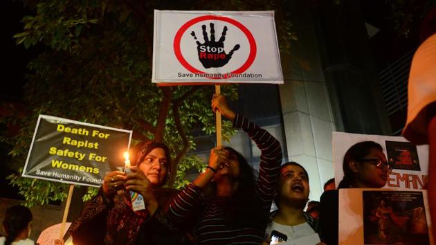 People take out at a candle light march to demand justice in Kathua and Unnao rape cases, in Navi Mumbai on April 18, 2018.(Bachchan Kumar/HT Photo)