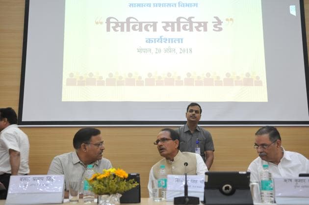 Bhopal, India - April 20, 2018: Madhya Pradesh chief minister Shivraj Singh Chouhan having aword with chief secretary B P Singh and DGP Rishi Kumar Shukla looks on during a workshop organised to mark the civil service day at Academy of administration in Bhopal, India, on Friday, April 20, 2018. (Photo by Mujeeb Faruqui/Hindustan Times)(Mujeeb Faruqui/HT Photo)