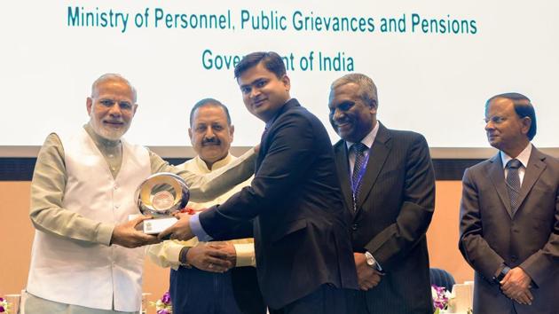 Prime Minister Narendra Modi presents an award to a civil servant during 12th Civil Services Day 2018 function in New Delhi on Saturday. (PTI Photo) Prime Minister Narendra Modi presents an award to a civil servant during 12th Civil Services Day 2018 function in New Delhi on Saturday. (PTI Photo)