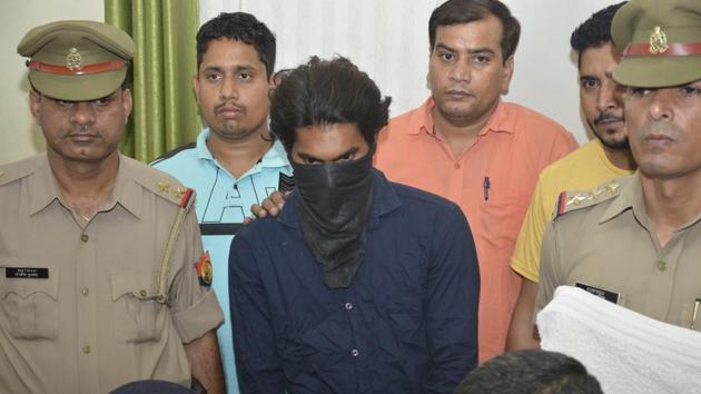 A 19-year-old and a 17-year-old were nabbed in Ghaziabad on Friday. Another accused remains absconding.(Sakib Ali/HT Photo)