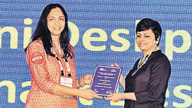 Ashwini Deshpande (right), founder of Elephant Design, receiving the Woman Champ award from Sujata Tilak, MD, Ascent Intellimination Pvt Ltd, at the TiECon awards function on Friday.(Shankar Narayan/HT PHOTO)