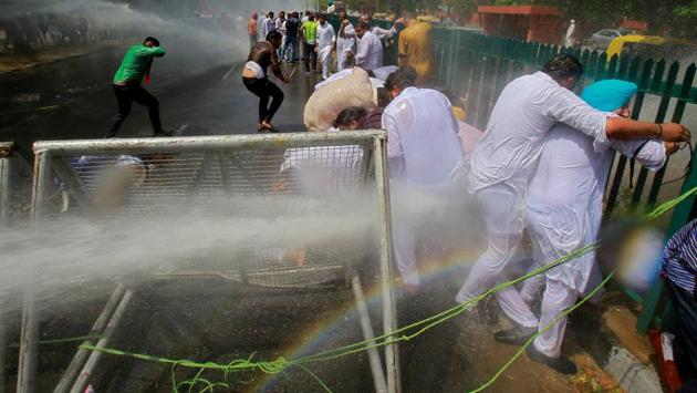 Police use water cannons to disperse activists of the Congress party’s youth wing during a protest to demand the release of scholarships for scheduled castes and scheduled tribes students, in Chandigarh on April 17, 2018. (Ajay Verma / REUTERS) Police use water cannons to disperse activists of the Congress party’s youth wing during a protest to demand the release of scholarships for scheduled castes and scheduled tribes students, in Chandigarh on April 17, 2018. (Ajay Verma / REUTERS)