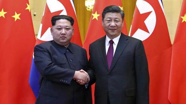 North Korean leader Kim Jong Un and Chinese President Xi Jinping shake hands in Beijing, during the formers surprise visit to China in March(AP)