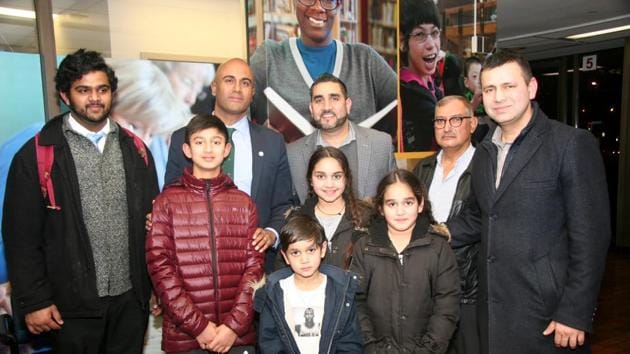 Toronto District School Board trustee Parthi Kandavel (second from left) with other board members and children after the adoption of a motion recognising November as Hindu Heritage Month in schools across the Canadian city.(HT Photo)