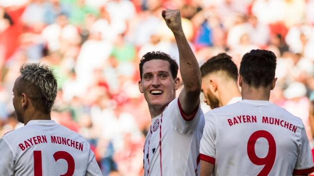 Sebastian Rudy (C) scored the third goal for Bayern Munich against Hanover 96 in Bundesliga.(AFP)