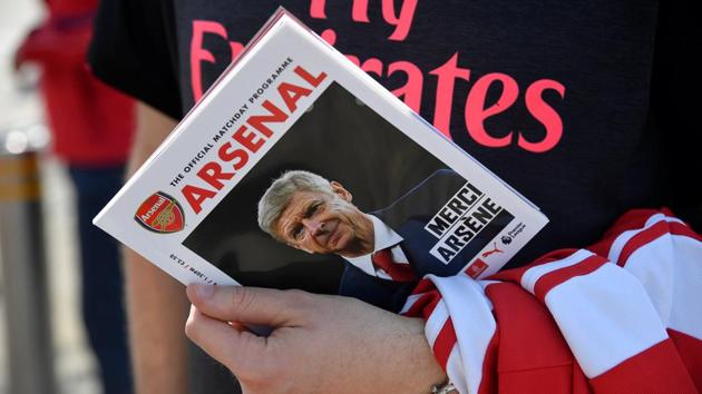 General view of a programme featuring Arsenal manager Arsene Wenger before the match/ (REUTERS) General view of a programme featuring Arsenal manager Arsene Wenger before the match/ (REUTERS)