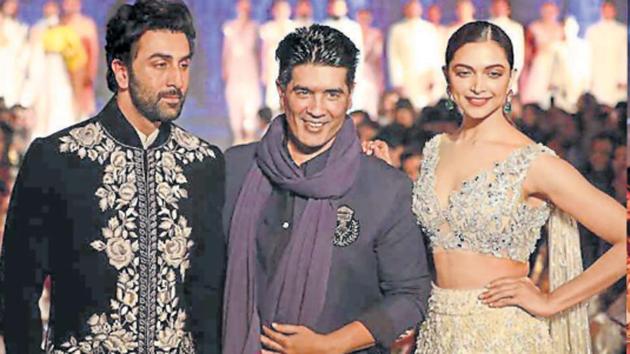 (LtoR) Ranbir Kapoor, Manish Malhotra and Deepika Padukone at the Mijwan fashion show. (LtoR) Ranbir Kapoor, Manish Malhotra and Deepika Padukone at the Mijwan fashion show.