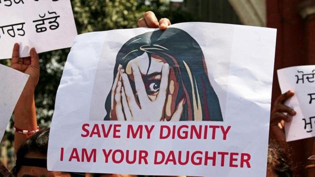 People protest in Amritsar against the rape of an eight-year-old girl in Kathua and a teenager in Unnao.(REUTERS)