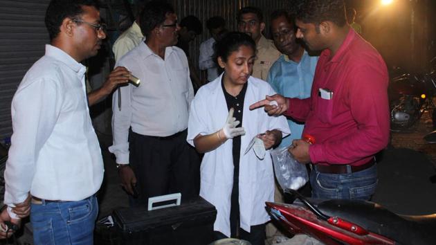 Forensic experts at the crime spot. (PRAMOD THAKUR/HT) Forensic experts at the crime spot. (PRAMOD THAKUR/HT)