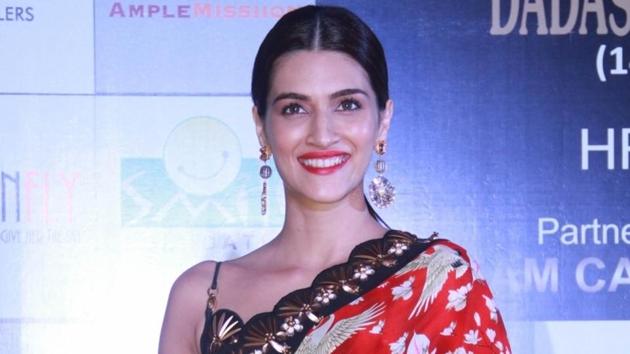 Kriti Sanon just showed that if she wants to wear saree, fringed pants, wrap skirt at one time, she will wear saree, fringed pants, wrap skirt at one time. (IANS)