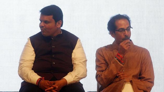 Maharashtra CM Devendra Fadnavis (left) with Shiv Sena chief Uddhav Thackeray (right)