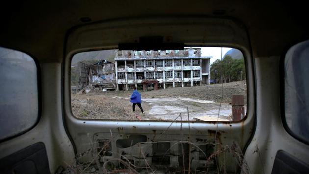 A boy runs through the quake hit site of Beichuan Vocational Education Centre. Sichuan remains seismically active. (Jason Lee / REUTERS)
