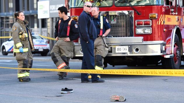 Shoes lay on the street as first responders secure the area in Toronto after the van mounted a sidewalk. Police shut down the Yonge and Finch intersection following the incident and Toronto’s transit agency said it had suspended service on the subway line running through the area. Prime Minister Justin Trudeau expressed his sympathies for those involved. (Nathan Denette / The Canadian Press via AP) Shoes lay on the street as first responders secure the area in Toronto after the van mounted a sidewalk. Police shut down the Yonge and Finch intersection following the incident and Toronto’s transit agency said it had suspended service on the subway line running through the area. Prime Minister Justin Trudeau expressed his sympathies for those involved. (Nathan Denette / The Canadian Press via AP)