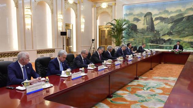 Heads of the delegation of the Shanghai Cooperation Organisation (SCO) have a meeting with Chinese President Xi jinping (R) at the Great Hall of the People in Beijing on April 23, 2018. (AFP) Heads of the delegation of the Shanghai Cooperation Organisation (SCO) have a meeting with Chinese President Xi jinping (R) at the Great Hall of the People in Beijing on April 23, 2018. (AFP)