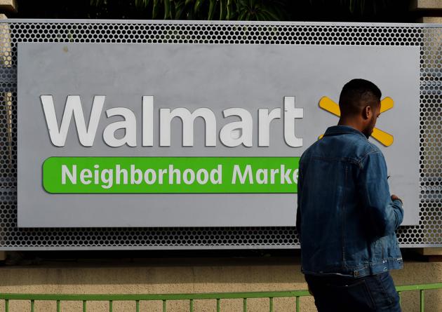A man walks past a Walmart store in Chinatown, Los Angeles.(AFP Photo)