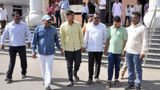 Congress corporator Vishal Kotkar (in yellow) arrested in Kedgaon double murder case in Ahmednagar on Tuesday.(HT Photo) Congress corporator Vishal Kotkar (in yellow) arrested in Kedgaon double murder case in Ahmednagar on Tuesday.(HT Photo)