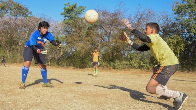 A game of football at a school in Pune. For the Playstation Generation, physical activity can enhance health, academic performance and overall productivity(Sanket Wankhade/HT PHOTO)