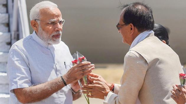 Prime Minister Narendra Modi is received by Chief Minister of Madhya Pradesh Shivraj Singh Chouhan, on his arrival at Jabalpur, Madhya Pradesh. On the occasion of National Panchayati Raj Day, Modi launched the Rashtriya Gram Swaraj Abhiyan at Ramnagar seeking to strengthen the country’s Panchayati Raj system and address gaps that hinder its success. (PTI / PIB) Prime Minister Narendra Modi is received by Chief Minister of Madhya Pradesh Shivraj Singh Chouhan, on his arrival at Jabalpur, Madhya Pradesh. On the occasion of National Panchayati Raj Day, Modi launched the Rashtriya Gram Swaraj Abhiyan at Ramnagar seeking to strengthen the country’s Panchayati Raj system and address gaps that hinder its success. (PTI / PIB)