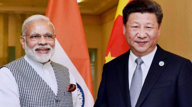 Prime Minister Narendra Modi with Chinese President Xi Jinping during a meeting in Tashkent on Thursday on the sidelines of SCO Summit.(PTI)