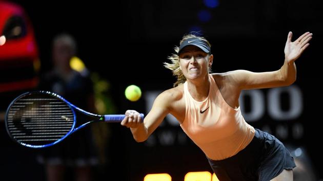 Russia's Maria Sharapova returns the ball to France's Caroline Garcia during their match at the WTA Tennis Grand Prix on Tuesday in Stuttgart.(AFP)
