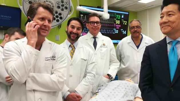 The medical team (L-R) Drs. Richard Redett,Trinity Bivalacqua, Brandacher Gerald, Arthur Bud Burnett and W.P. Andrew Lee(R), professor and director of plastic and reconstructive surgery at the Johns Hopkins University School of Medicine standing near a mannequin. (AFP) The medical team (L-R) Drs. Richard Redett,Trinity Bivalacqua, Brandacher Gerald, Arthur Bud Burnett and W.P. Andrew Lee(R), professor and director of plastic and reconstructive surgery at the Johns Hopkins University School of Medicine standing near a mannequin. (AFP)