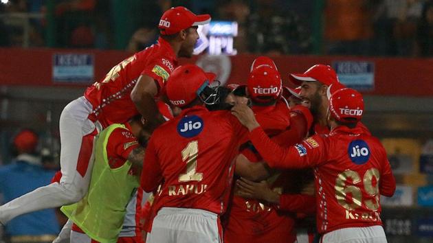 Kings XI Punjab players celebrate after beating Delhi Daredevils in their 2018 Indian Premier League (IPL 2018) match at the Feroz Shah Kotla in New Delhi on Monday. Daredevils, chasing a modest KXIP total of 143, fell short by 4 runs in the final over after Mujeeb Ur Rahman picked up the wicket of Shreyas Iyer on the last ball. (BCCI)
