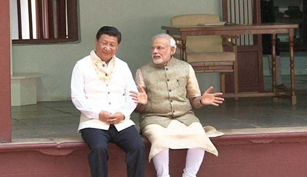 Xi Jinping and Prime Minister Narendra Modi share a quiet moment at the Sabarmati Ashram in Ahmedabad during the Chinese president’s India visit.(AFP file Photo)