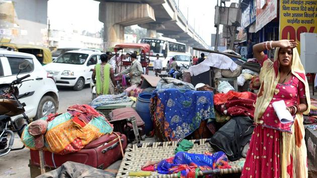 Angry at the evictions, many residents chose to live in the open by the Shadipur flyover or on the pavements with the sum of their belongings. The DDA and the Delhi Police denied allegations of the use of force in the evictions that the move drew from some residents. (Arun Sharma / HT Archive)