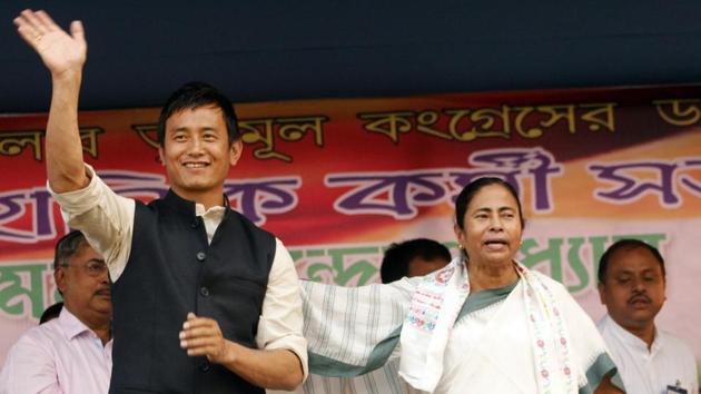 Former Indian football captain and Darjeeling Lok Shaba candidate from Trinamool Congress, Bhaichung Bhutia, with West Bengal chief minister Mamata Banerjee during an election rally in Siliguri on March 25, 2014. (HT Archive) Former Indian football captain and Darjeeling Lok Shaba candidate from Trinamool Congress, Bhaichung Bhutia, with West Bengal chief minister Mamata Banerjee during an election rally in Siliguri on March 25, 2014. (HT Archive)