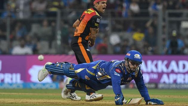 Sunrisers Hyderabad (SRH) bowler Siddarth Kaul celebrates after talking the wicket of Mumbai Indians cricketer Mitchell McClenaghan during the 2018 Indian Premier League (IPL 2018) match at the Wankhede Stadium in Mumbai on Tuesday.(AFP)