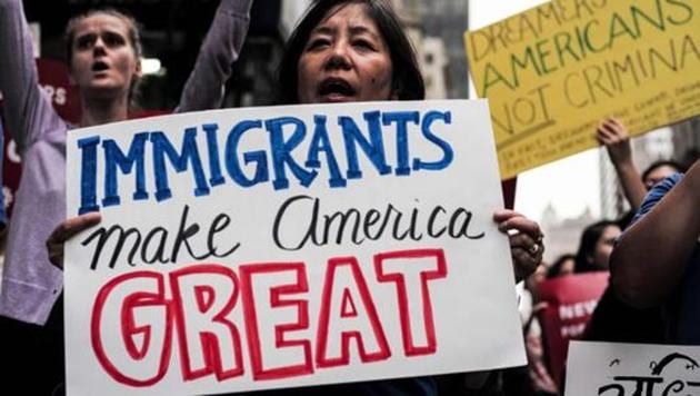 (FILES) This file photo taken on October 5, 2017 shows protesters during a demonstration against US President Donald Trump during a rally in support of the Deferred Action for Childhood Arrivals (DACA), also known as Dream Act, near the Trump Tower in New York.(AFP)