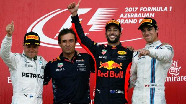 FILE PHOTO: After an exciting and incident-filled race last year at the Azerbaijan GP in Baku, Red Bull Racing Formula One (F1) driver Daniel Ricciardo (2nd right) won it ahead of Mercedes' Valtteri Bottas (left), and Williams' Lance Stroll (right).(Reuters)