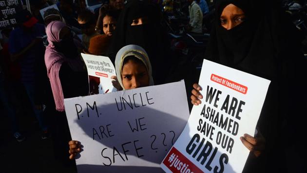 Sexual assault cases were reported in Kathua, Jammu and Kashmir and Unnao, Uttar Pradesh, wherein minors were brutally raped and murdered. After national and international uproar against the two cases, the Criminal Law Amendment Ordinance, 2018, was passed by the central government. Members of Association of Pune NGOs staged a protest rally against the incidents at Kathua and Unnao at Kondhwa in Pune on Sunday, April 22. (Shankar Narayan/HT PHOTO) 