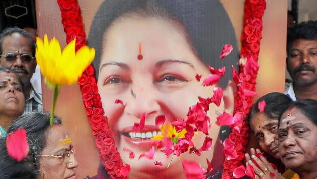 AIADMK members pay floral tribute to former Tamil Nadu chief minister J Jayalalithaa on her 70th birth anniversary in Coimbatore on February 24.(PTI File Photo)