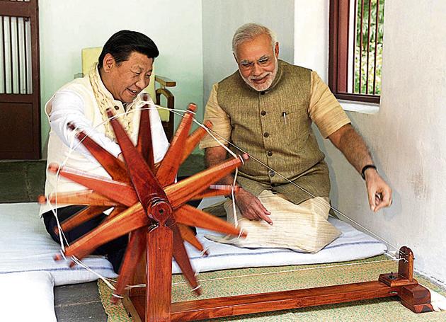 Xi Jinping with Narendra Modi at the Sabarmati Ashram in Ahmedabad, Gujarat on September 17, 2014.(Photo Division/PIB) Xi Jinping with Narendra Modi at the Sabarmati Ashram in Ahmedabad, Gujarat on September 17, 2014.(Photo Division/PIB)