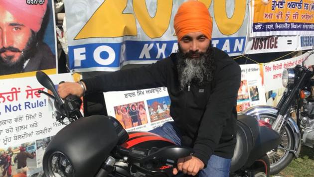 Hardeep Singh Nijjar, wanted in India for targeted killings in Punjab, poses on a motorcycle in front of the Sikhs For Justice float at the nagar kirtan in Surrey last weekend.(Courtesy: Sikhs For Justice)